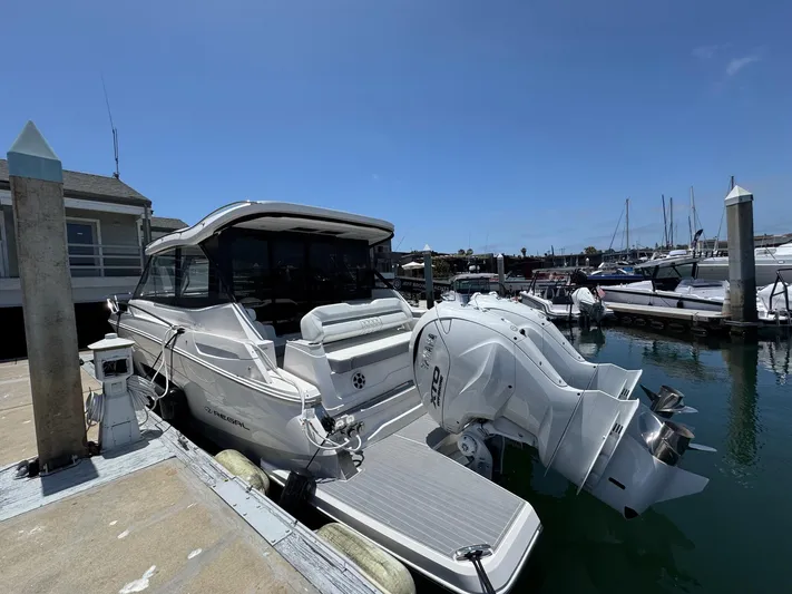 36 Xo Yacht Photos Pics 2026 Regal 36 XO boat docked at marina with twin outboard engines.