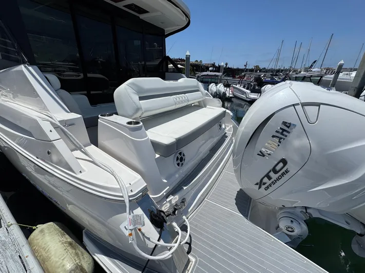 36 Xo Yacht Photos Pics 2026 Regal 36 XO boat with Yamaha XTO engine docked at marina.