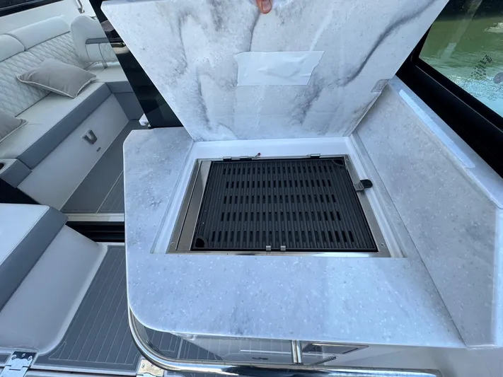 36 Xo Yacht Photos Pics Marble countertop with built-in grill on 2026 Regal 36 XO boat.