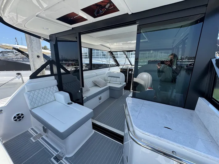 36 Xo Yacht Photos Pics Luxurious interior of 2026 Regal 36 XO yacht with modern seating and sleek design.