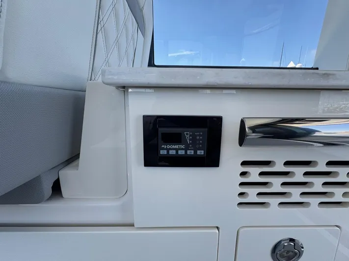 36 Xo Yacht Photos Pics Control panel on 2026 Regal 36 XO yacht interior, featuring Dometic system.