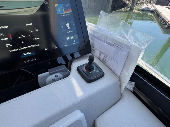 36 Xo Yacht Photos Pics Control panel of 2026 Regal 36 XO boat with Garmin display and joystick.