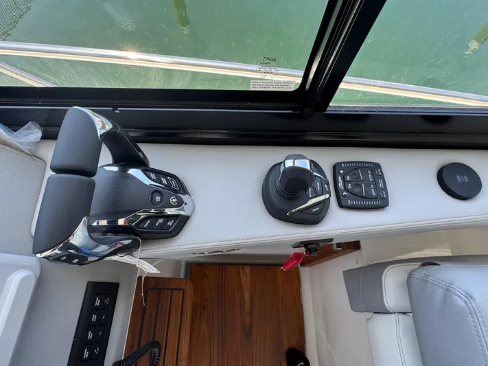 36 Xo Yacht Photos Pics Control panel of 2026 Regal 36 XO boat with joystick and throttle.