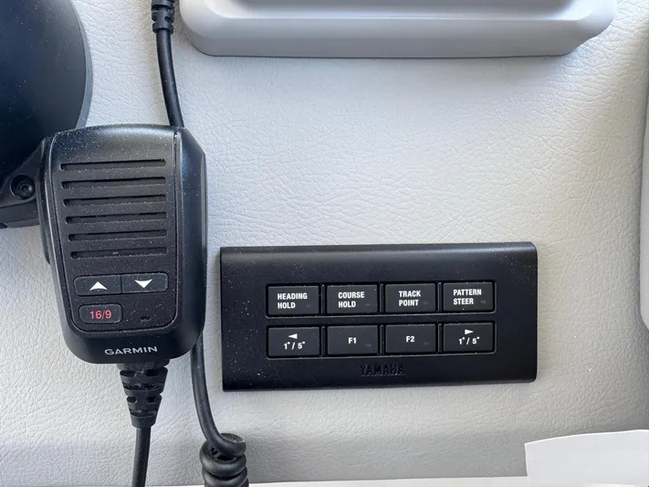 36 Xo Yacht Photos Pics Control panel and Garmin device on 2026 Regal 36 XO boat dashboard.