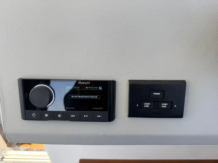 36 Xo Yacht Photos Pics Control panel of a 2026 Regal 36 XO boat with audio and power switches.