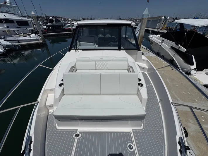 36 Xo Yacht Photos Pics 2026 Regal 36 XO yacht with sleek design docked at marina.