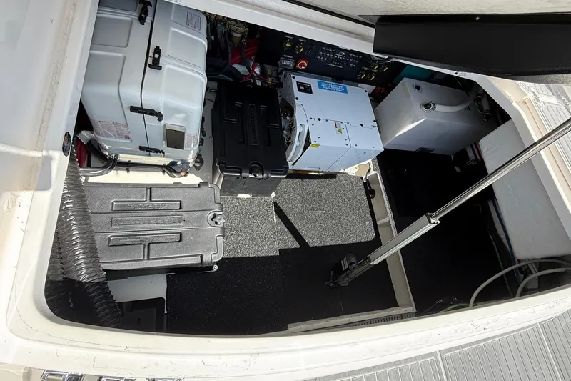 36 Xo Yacht Photos Pics Engine compartment of 2026 Regal 36 XO boat, showcasing equipment and storage layout.