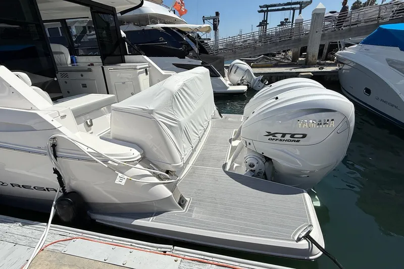 36 Xo Yacht Photos Pics 2026 Regal 36 XO boat with Yamaha XTO Offshore engine docked at marina.