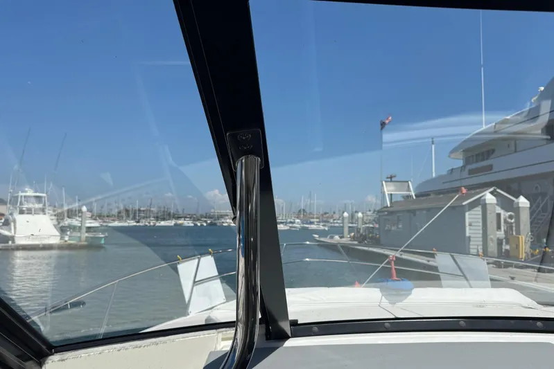 36 Xo Yacht Photos Pics View from 2026 Regal 36 XO yacht cockpit, overlooking marina and docked boats.