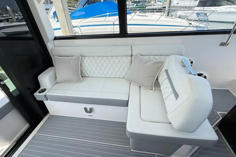 36 Xo Yacht Photos Pics Luxurious seating area on 2026 Regal 36 XO yacht with elegant cushions and modern design.