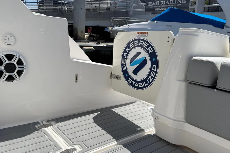 36 Xo Yacht Photos Pics 2026 Regal 36 XO boat featuring Seakeeper stabilization system at dock.