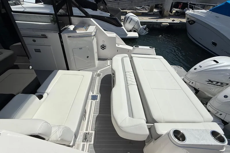 36 Xo Yacht Photos Pics 2026 Regal 36 XO yacht interior with white seating and modern amenities.