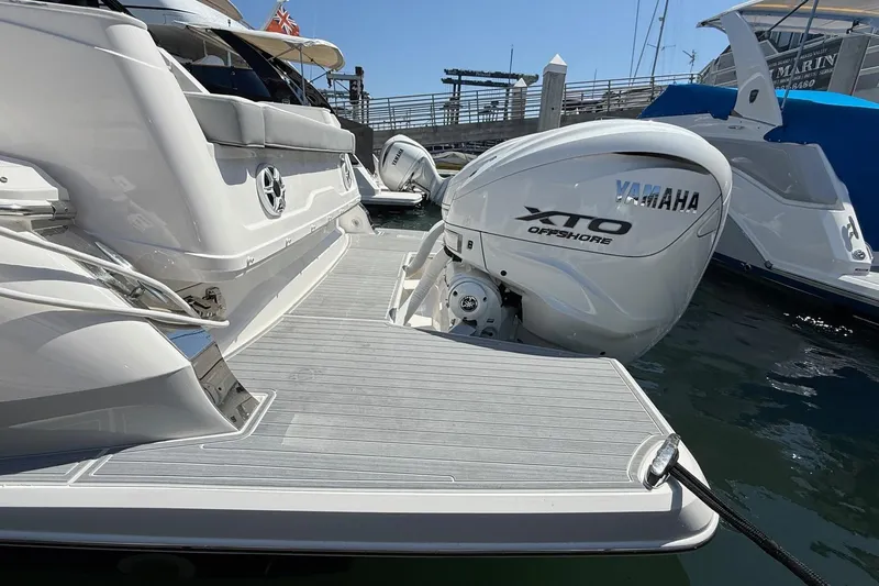 36 Xo Yacht Photos Pics 2026 Regal 36 XO yacht with Yamaha XTO Offshore engine at marina dock.