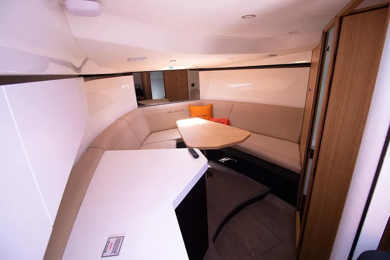  Yacht Photos Pics Interior of 2021 Fairline F Line 33 yacht with modern seating and table.