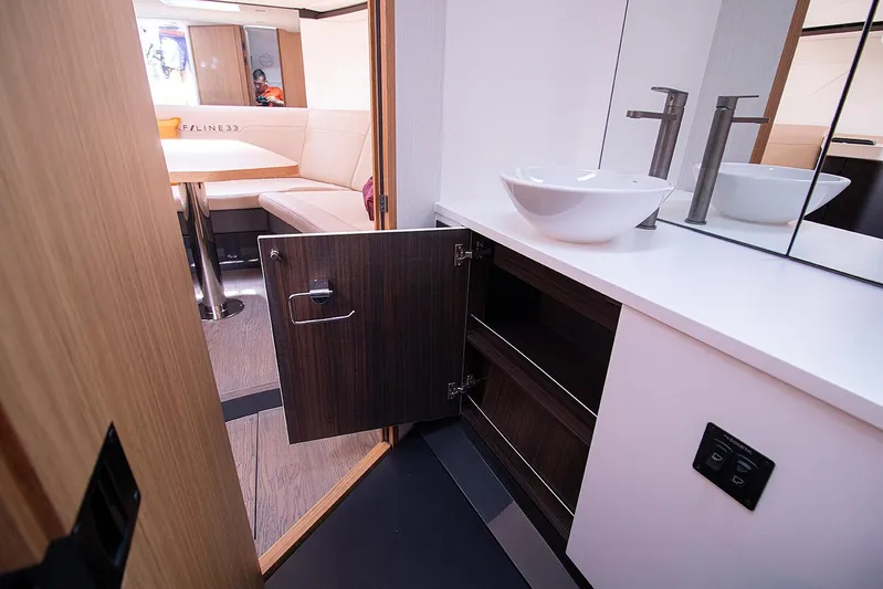  Yacht Photos Pics Modern bathroom and lounge area in 2021 Fairline F Line 33 yacht.