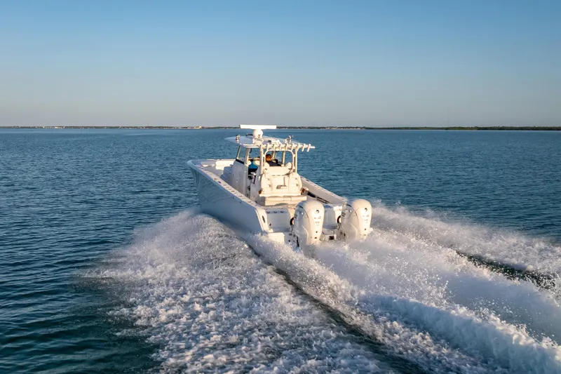  Yacht Photos Pics 2026 Freeman 35 boat cruising on open water, showcasing powerful engines and sleek design.