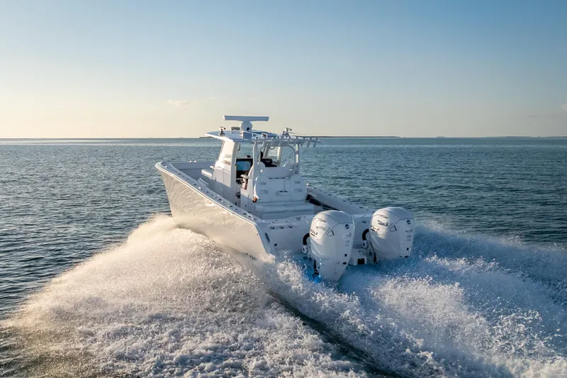  Yacht Photos Pics 2026 Freeman 35 boat cruising on open water at high speed.