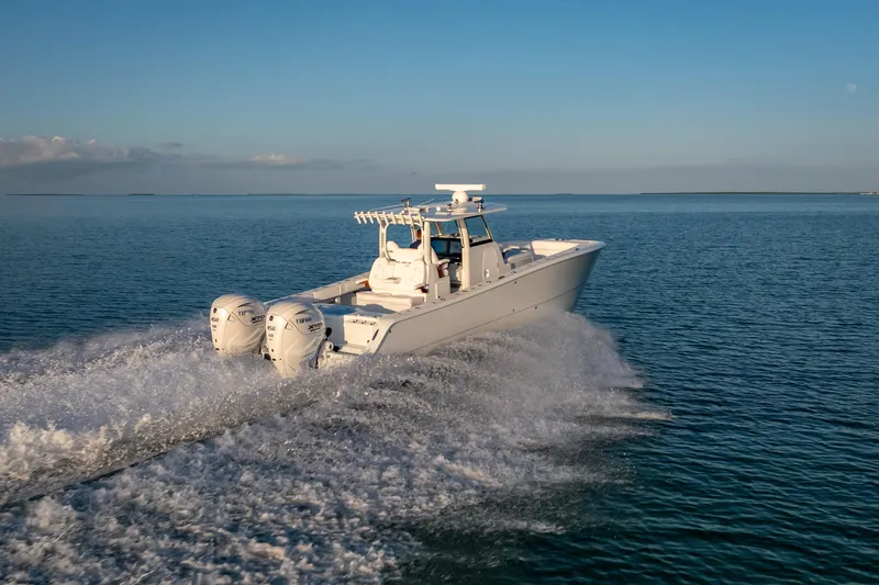  Yacht Photos Pics 2026 Freeman 35 boat cruising on open water at high speed.