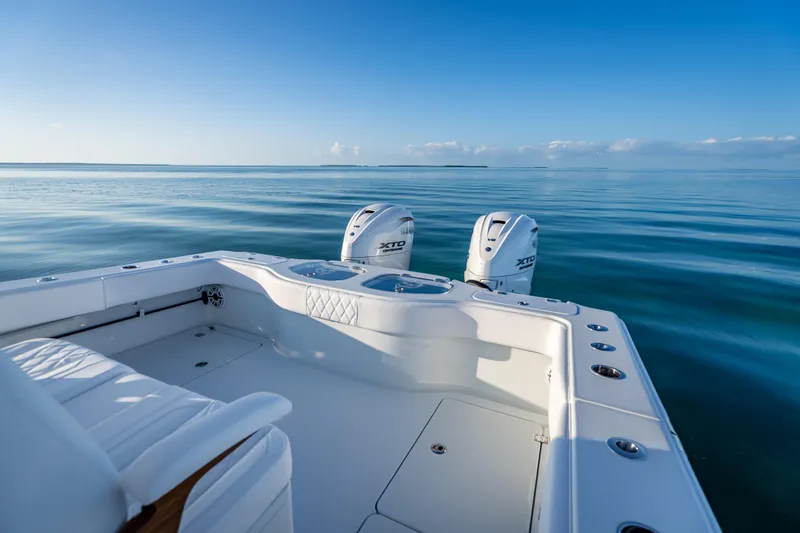  Yacht Photos Pics Freeman 35 boat, 2026 model, on calm ocean waters under clear blue sky.