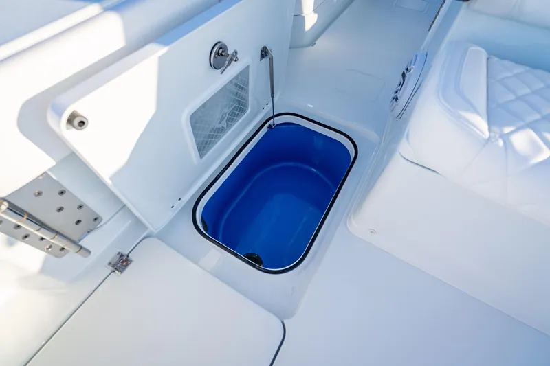  Yacht Photos Pics Freeman 35 boat interior, 2026 model, featuring a blue storage compartment.