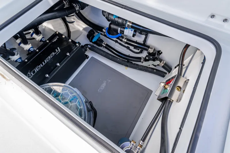  Yacht Photos Pics Engine compartment of 2026 Freeman 35 boat, showcasing wiring and components.
