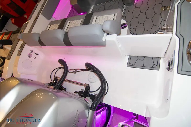  Yacht Photos Pics 2023 Fountain 34 SC boat interior with seating and dual engines.