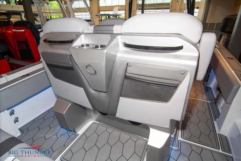  Yacht Photos Pics 2023 Fountain 34 SC boat interior with modern seating and storage compartments.