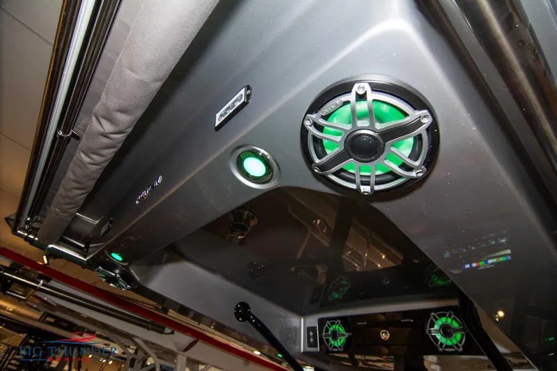  Yacht Photos Pics 2023 Fountain 34 SC boat interior with green LED-lit speakers.