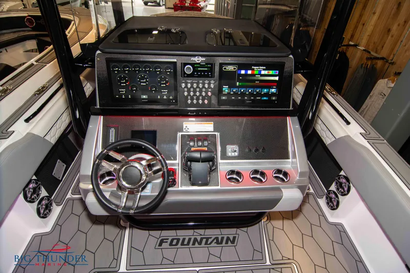  Yacht Photos Pics 2023 Fountain 34 SC boat dashboard with advanced controls and navigation system.