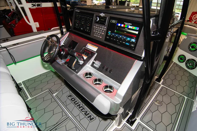  Yacht Photos Pics 2023 Fountain 34 SC boat dashboard with advanced controls and navigation systems.