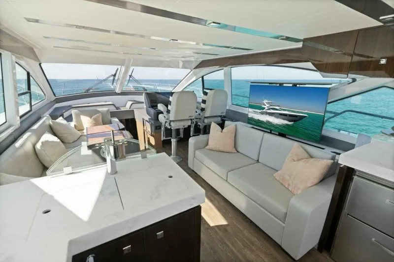  Yacht Photos Pics Luxurious interior of 2018 Cruisers Yachts 60 Fly with ocean view and modern amenities.