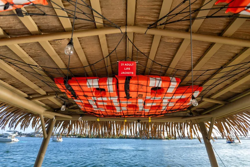 Tiki International Yacht Photos Pics Tiki hut ceiling with life jackets, Beachcat 26 Tiki COI, 2023 model, by the water.