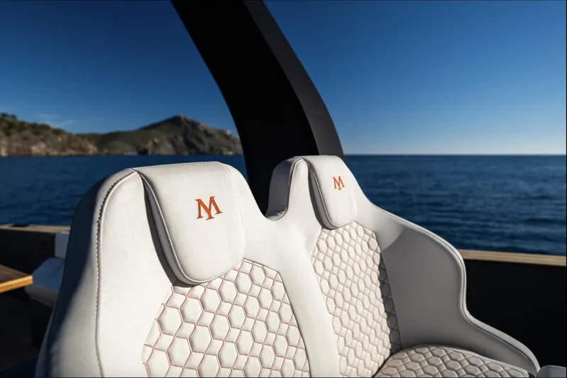 Max44r Yacht Photos Pics Luxury seating on 2025 Maxim Yachts MAX44R, featuring elegant design and ocean backdrop.