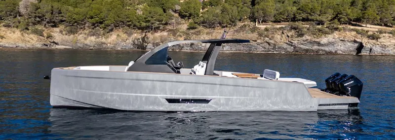 Max44r Yacht Photos Pics 2025 Maxim Yachts MAX44R luxury boat on serene water, surrounded by lush greenery.