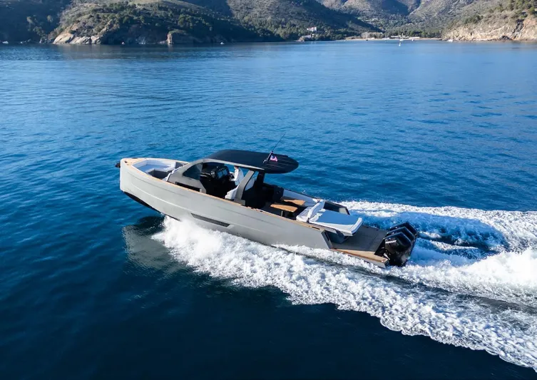 Max44r Yacht Photos Pics 2025 Maxim Yachts MAX44R cruising on serene blue waters, showcasing sleek design and performance.
