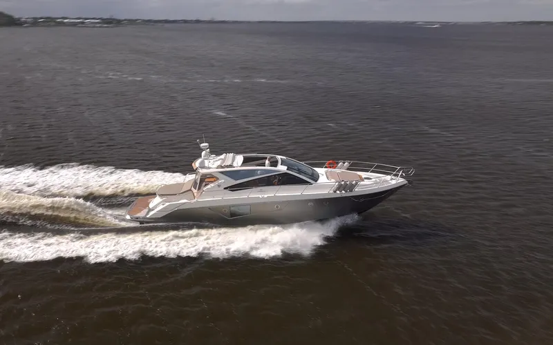 Dominus Yacht Photos Pics 2012 Cranchi 56 yacht cruising on open water.