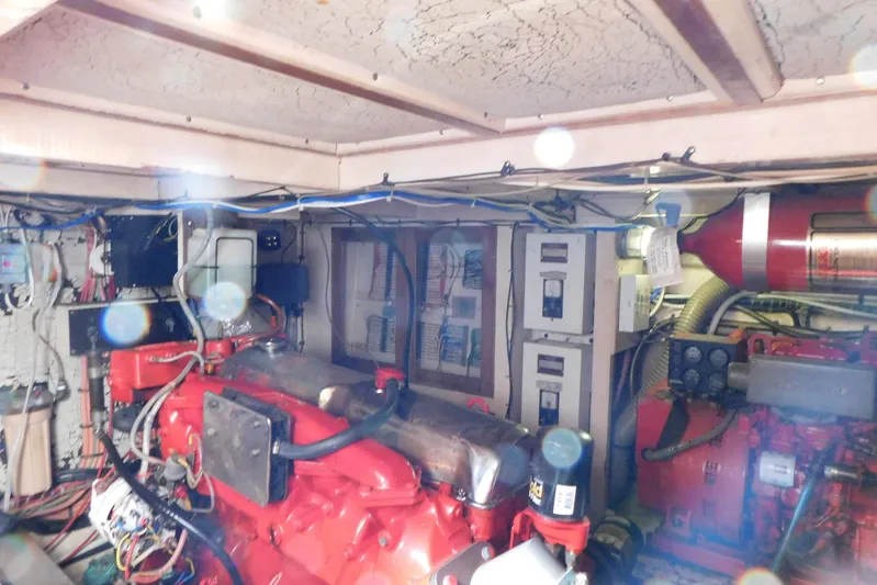 Susan Gail Yacht Photos Pics Engine room of 1986 Grand Banks 46 Classic yacht with red machinery and wiring.