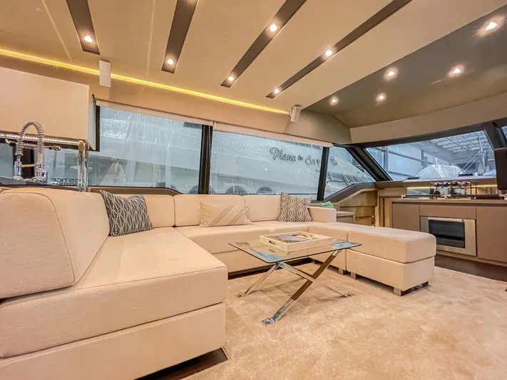 Total Package Yacht Photos Pics Luxurious interior of 2016 Prestige 680 Flybridge yacht with modern furnishings and elegant design.