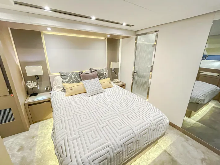 Total Package Yacht Photos Pics Luxurious bedroom interior of 2016 Prestige 680 Flybridge yacht with modern decor.