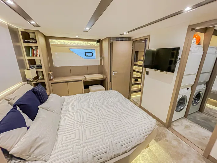 Total Package Yacht Photos Pics Luxurious bedroom in 2016 Prestige 680 Flybridge yacht with modern amenities and elegant design.