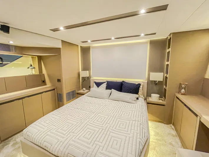 Total Package Yacht Photos Pics Luxurious bedroom interior of 2016 Prestige 680 Flybridge yacht with modern design.