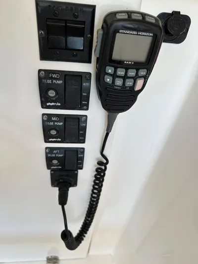 Bay Saddle Yacht Photos Pics 2005 Sabre 38 Hardtop Express control panel with radio and bilge pump switches.