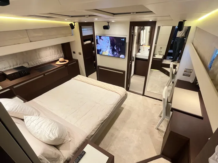 Princess Of The Seas Yacht Photos Pics Luxurious bedroom interior of 2017 Jeanneau Prestige 750 yacht with modern amenities.