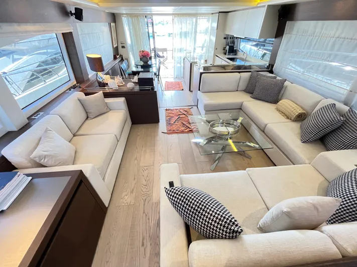 Princess Of The Seas Yacht Photos Pics Luxurious interior of 2017 Jeanneau Prestige 750 yacht with elegant seating and modern decor.