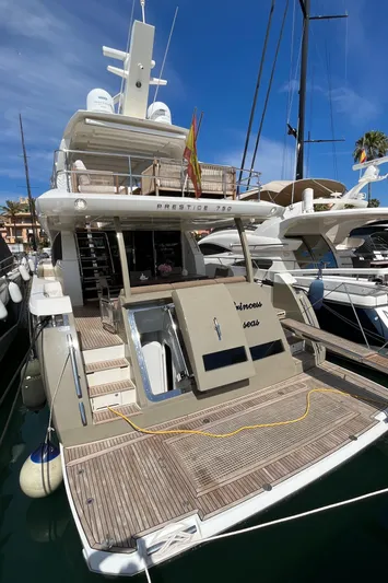 Princess Of The Seas Yacht Photos Pics 2017 Jeanneau Prestige 750 yacht docked at marina, rear view.