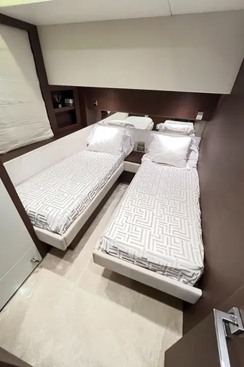 Princess Of The Seas Yacht Photos Pics Twin beds in a 2017 Jeanneau Prestige 750 yacht cabin with modern decor.