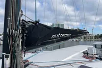 Outremer 4X 2018 sailboat mast and rigging in marina setting.