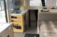 Interior of 2018 Outremer 4X catamaran with cozy furnishings and modern amenities.
