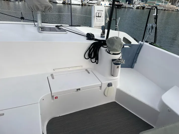 Inconceivable Yacht Photos Pics 2018 Outremer 4X yacht deck with seating, ropes, and marina view.