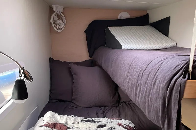 Inconceivable Yacht Photos Pics Cozy cabin interior of 2018 Outremer 4X with bunk beds and modern decor.